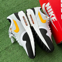 Load image into Gallery viewer, Nike  University Gold Air Max 1s Size 12
